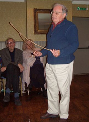 John Baker demonstrating the use of the forked stick